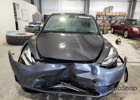 2022 Tesla Model Y from USA, damaged, VIN 7SAYGAEE9NF398040
